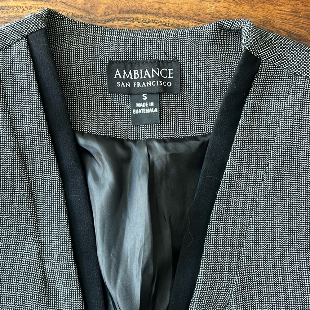 Jacket small by ambiance . Mix polyester, rayon and spandex . Nice fitting